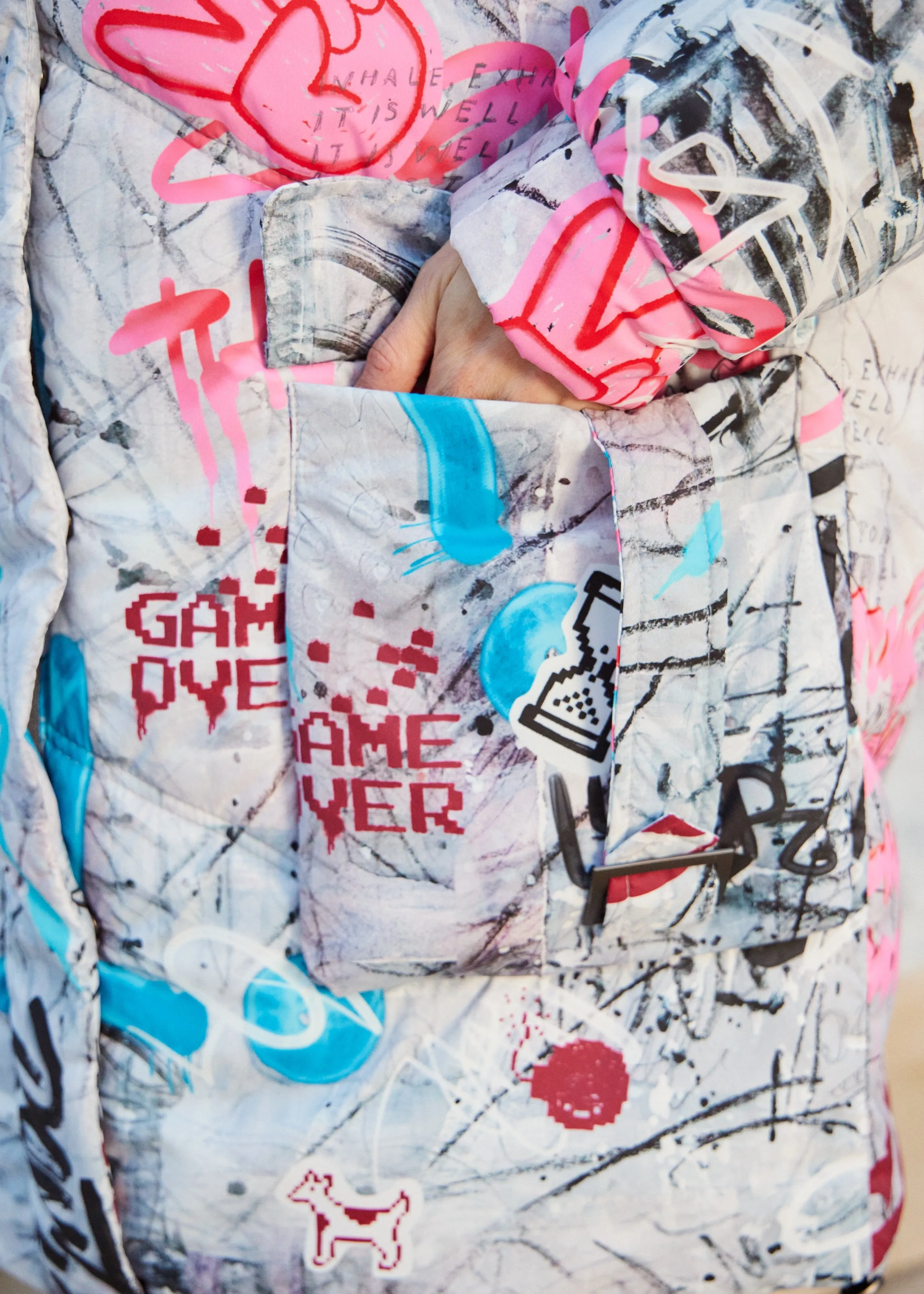 Graffity Printed Puffer Jacket for Women  Artistic & Cozy Design